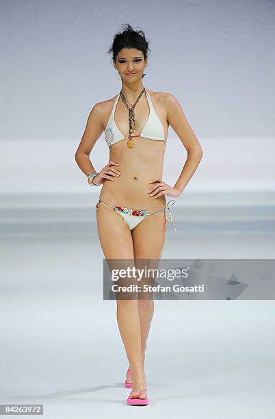 Model showcases designs by Oceano Pacifico as part of the Taipei In Style Fashion show on the catwalk as part of Hong Kong Fashion Week Fall/Winter...