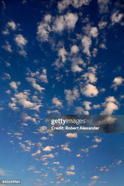 High-altitude cirrocumulus clouds form above Santa Fe, New Mexico.