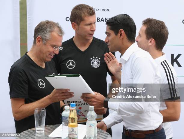 Germany U18 coach Guido Streichsbier and Germany U16 coach Michael Feichtenbeiner perform a show training for DFB junior coaches on September 4, 2017...