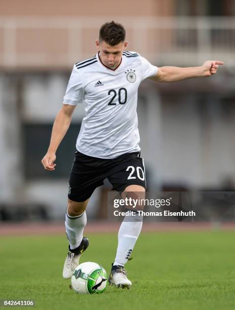 Robin Becker of Germany plays the ball during the Under 20 Elite League match between Czech Republic U20 and Germany U20 at stadium Juliska on...