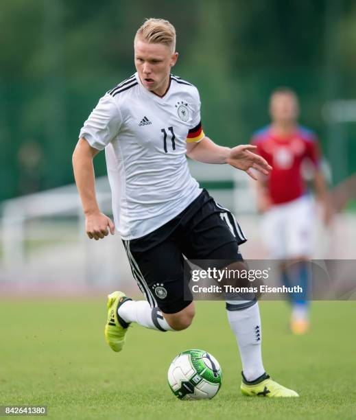 Philipp Ochs of Germany plays the ball during the Under 20 Elite League match between Czech Republic U20 and Germany U20 at stadium Juliska on...