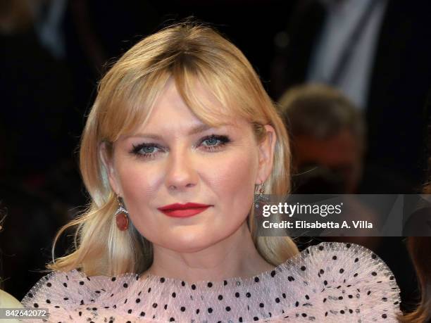 Kirsten Dunst walks the red carpet ahead of the 'Woodshock' screening during the 74th Venice Film Festival at Sala Giardino on September 4, 2017 in...