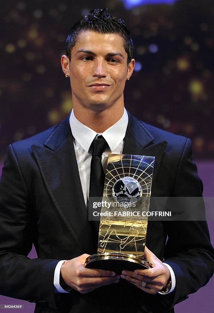 Ron Rector Football Player Portuguese football player Cristiano Ronaldo poses after receiving ...
