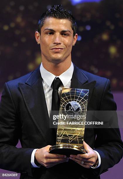 Portuguese football player Cristiano Ronaldo poses after receiving FIFA world Footballer of the Year 2008 award on January 12, 2009 in Zurich....