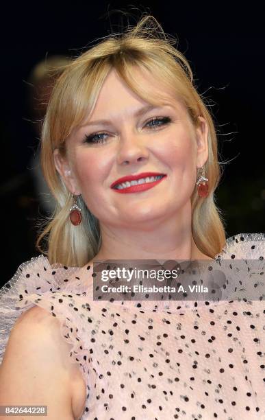 Kirsten Dunst walks the red carpet ahead of the 'Woodshock' screening during the 74th Venice Film Festival at Sala Giardino on September 4, 2017 in...