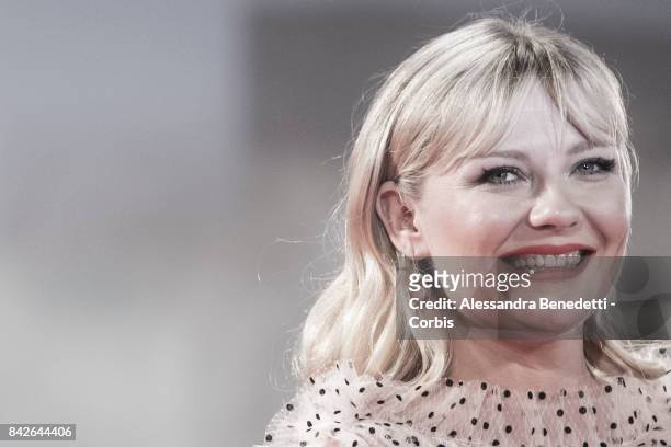 Kirsten Dunst walks the red carpet ahead of the 'TWoodshock' screening during the 74th Venice Film Festival at Sala Giardino on September 4, 2017 in...