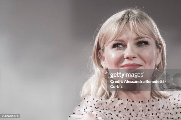 Kirsten Dunst walks the red carpet ahead of the 'TWoodshock' screening during the 74th Venice Film Festival at Sala Giardino on September 4, 2017 in...