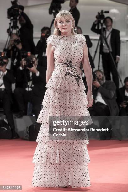 Kirsten Dunst walks the red carpet ahead of the 'TWoodshock' screening during the 74th Venice Film Festival at Sala Giardino on September 4, 2017 in...