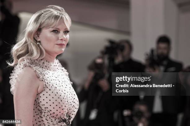 Kirsten Dunst walks the red carpet ahead of the 'TWoodshock' screening during the 74th Venice Film Festival at Sala Giardino on September 4, 2017 in...