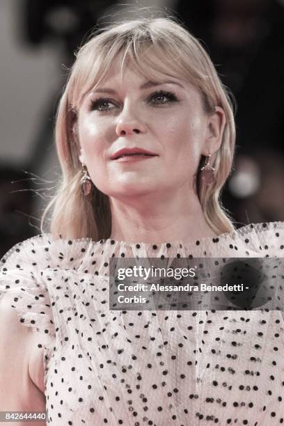 Kirsten Dunst walks the red carpet ahead of the 'TWoodshock' screening during the 74th Venice Film Festival at Sala Giardino on September 4, 2017 in...