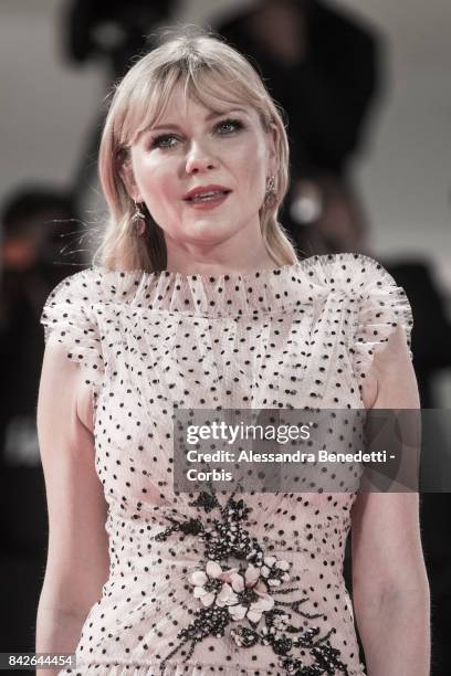 Kirsten Dunst walks the red carpet ahead of the 'TWoodshock' screening during the 74th Venice Film Festival at Sala Giardino on September 4, 2017 in...