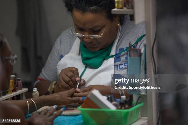 fingernail paint service at havana, cuba - cuba painter stock pictures, royalty-free photos & images