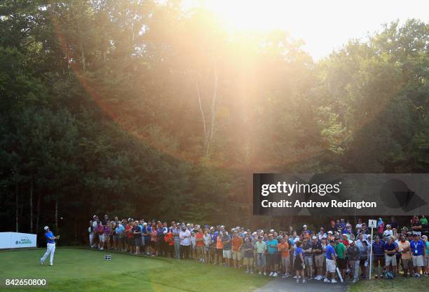 Justin Thomas of the United States plays his shot from the 15th tee during the final round of the Dell Technologies Championship at TPC Boston on...