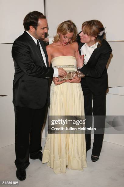 Xavier Demaison, Ludivine Saignier and Julie Depardieu pose in the award room at the Cesar Film Awards 2008 held at the Chatelet Theater on February...