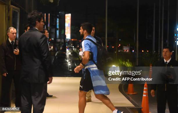 Uruguayan national football team player Luis Suarez arrives at a hotel on September 4 in Luque, Paraguay, ahead of their World Cup 2018 South...