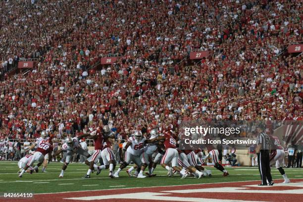 Ohio State Sean Nuernberger kicking an extra point in front of a sold-out crowd during their season opening college football game between the Ohio...