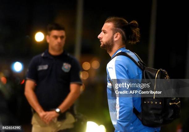 Uruguayan national football team player Gaston Silva arrives at a hotel on September 4 in Luque, Paraguay, ahead of their World Cup 2018 South...