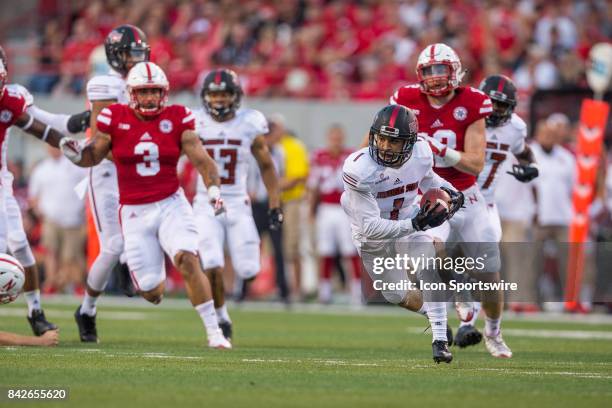 Arkansas State Red Wolves defensive back Blaise Taylor scoops up his fumble and runs for a 63 yard touchdown during the first half against the...