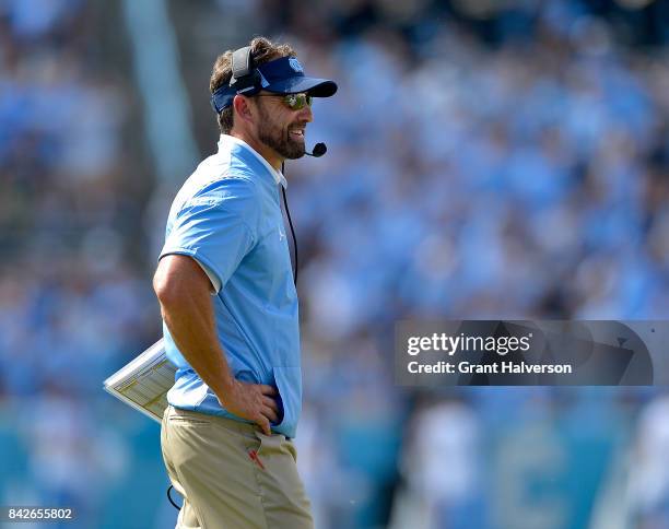 Head coach Larry Fedora of the North Carolina Tar Heels watches during their game against the California Golden Bears at Kenan Stadium on September...