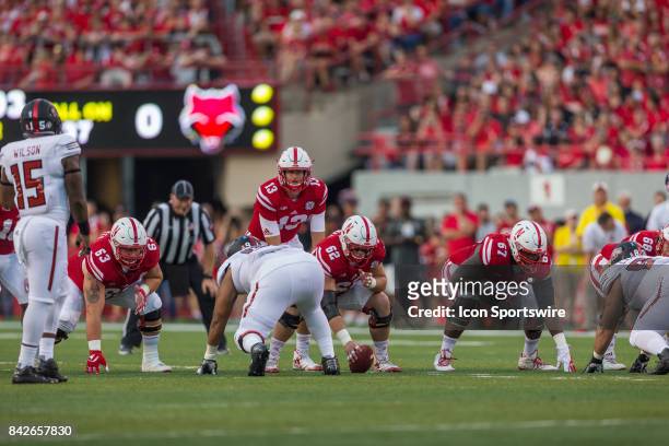 Nebraska quarterback Tanner Lee is ready to take the snap during the first half against the Arkansas State Red Wolves on September 02, 2017 at...