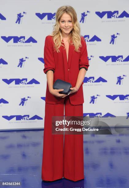 Poppy Jamie arrives at the 2017 MTV Video Music Awards at The Forum on August 27, 2017 in Inglewood, California.