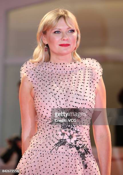 American actress Kirsten Dunst arrives at the red carpet of film 'Woodshock' screening during the 74th Venice Film Festival at Sala Giardino on...