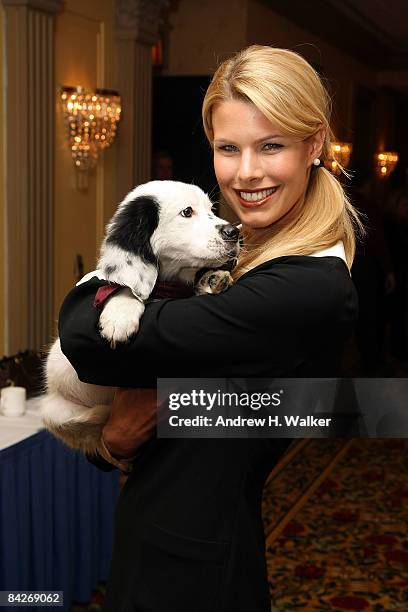 Beth Stern holds a puppy at the Pet Savers Foundation launch of the American Mutt-i-grees Club at the Algonquin Hotel on January 13, 2009 in New York...