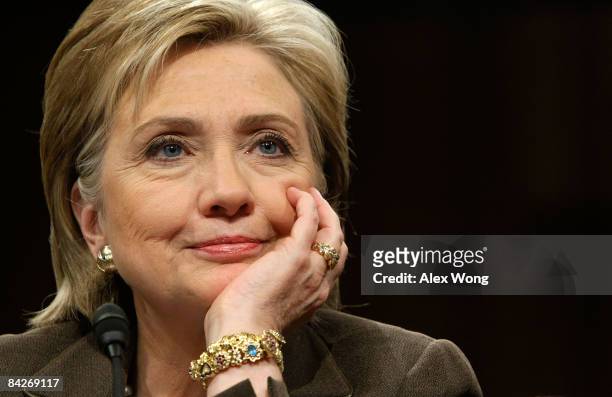 Secretary of State Nominee and incumbent U.S. Sen. Hillary Rodham Clinton listens as she testifies during her confirmation hearing before the Senate...