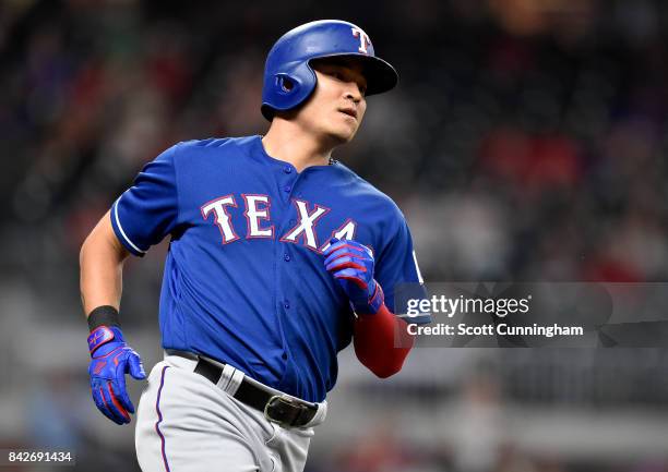 Shin-Soo Choo of the Texas Rangers hits an eighth inning single against the Atlanta Braves at SunTrust Park on September 4, 2017 in Atlanta, Georgia.