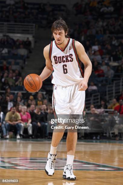 Andrew Bogut of the Milwaukee Bucks dribbles the ball against the Indiana Pacers on December 13, 2008 at the Bradley Center in Milwaukee, Wisconsin....