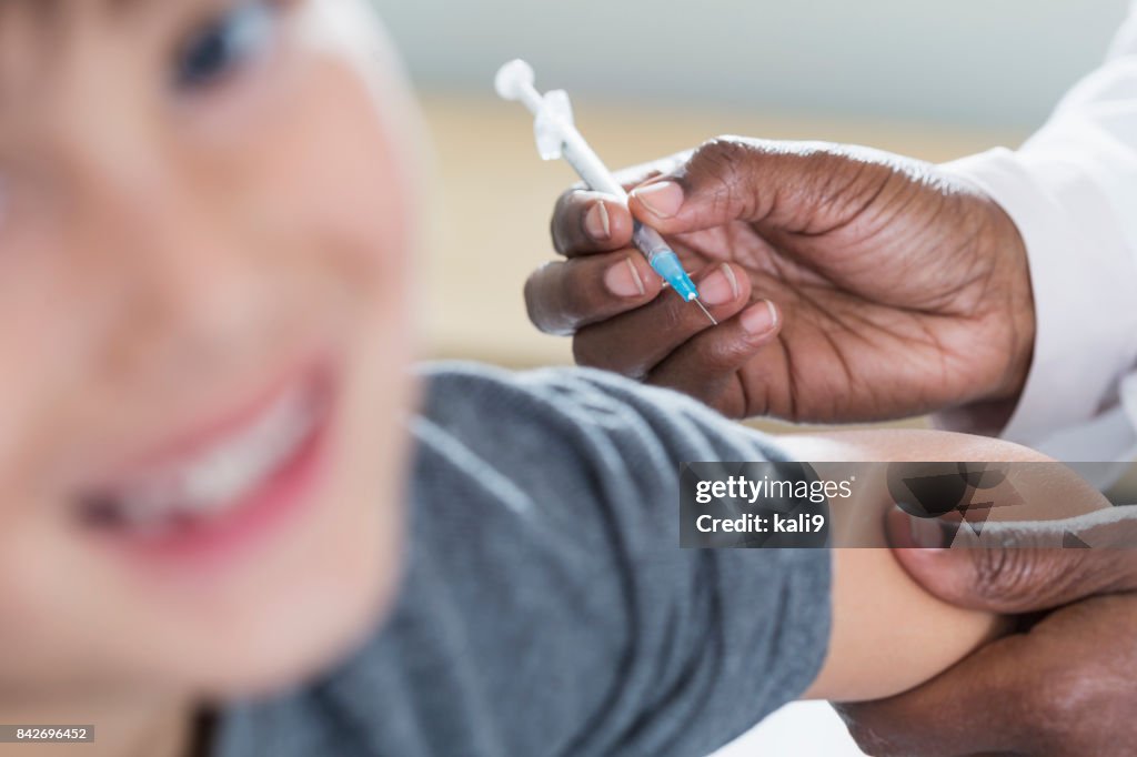 Child Injection Kit Closeup Of Doctor Giving Injection To Child High-Res Stock Photo ...