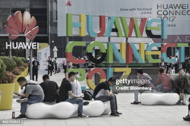 Visitors wait to enter the Huawei Connect 2017 conference in Shanghai, China, on Tuesday, Sept. 5, 2017. Huawei Technologies Co. Aims to establish a...