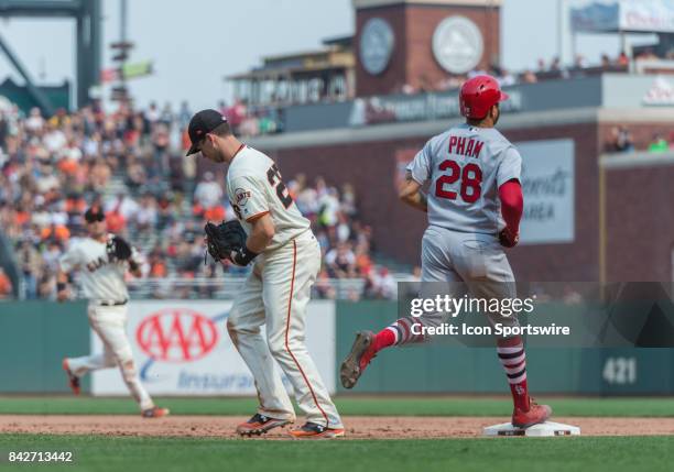 St. Louis Cardinals Outfield Tommy Pham tagged out by San Francisco Giants infielder Buster Posey during a the San Francisco Giants versus St. Louis...