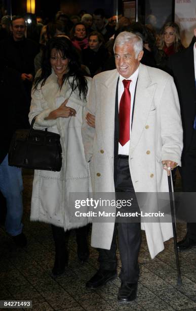 French Actor Jean-Paul Belmondo and Barbara Gandolfi are seen leaving the premiere of "Un homme et son chien" at Gaumont Marignan January 13, 2009 in...