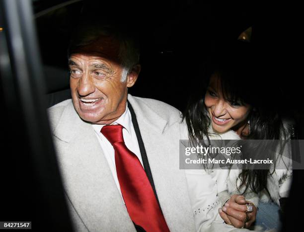 French Actor Jean-Paul Belmondo and Barbara Gandolfi are seen leaving the premiere of "Un homme et son chien" at Gaumont Marignan January 13, 2009 in...