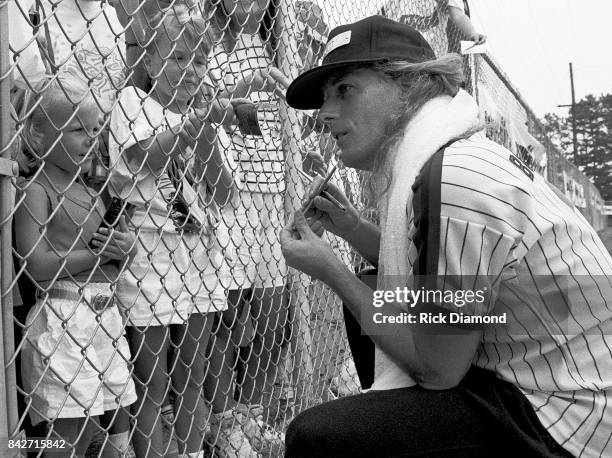 Singer/Songwriter Michael Bolton and The Bolton Bombers play 99X in a charity softball game at Georgia Tech. In Atlanta Georgia July 30, 1991