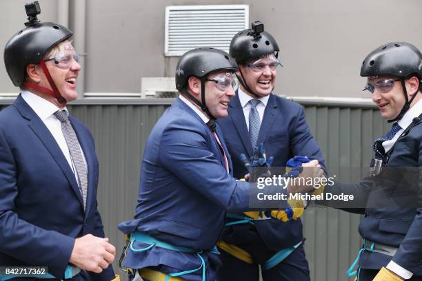 Fox Footy's Dermott Brereton David King Jonathan Brown and Ben Dixon show relied after scaling down during the Fox Footy Finals Launch on September...