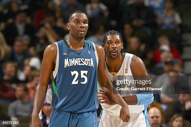 Nene of the Denver Nuggets guards Al Jefferson of the Minnesota Timberwolves on December 10, 2008 at the Pepsi Center in Denver, Colorado. NOTE TO...