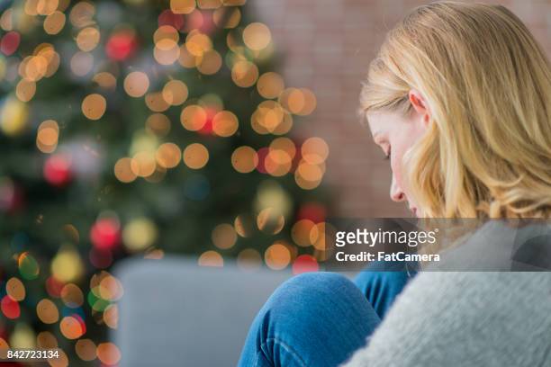 alone on christmas - depression sadness stock pictures, royalty-free photos & images
