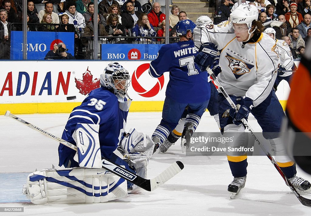 Toronto Predators Vesa Toskala of the Toronto Maple Leafs makes a save on Vernon... News ...