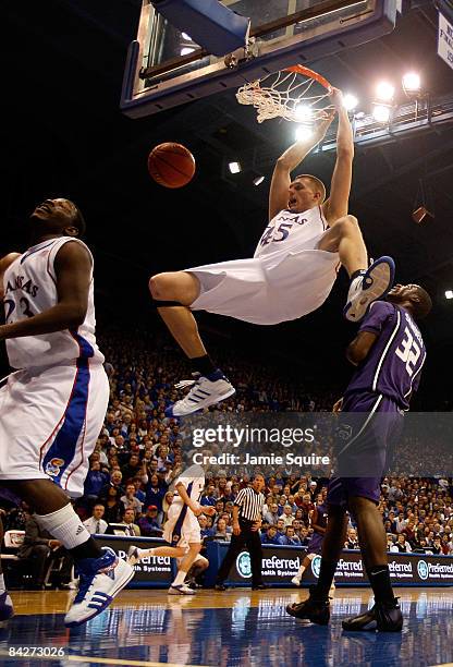 Cole Aldrich of the Kansas Jayhawks dunks against the Kansas State Wildcats during the game on January 13, 2009 at Allen Fieldhouse in Lawrence,...