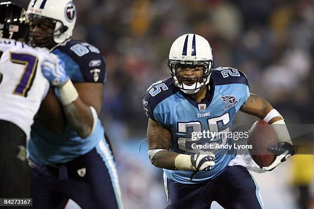 Running back LenDale White of the Tennessee Titans runs the ball against the Baltimore Ravens during the AFC Divisional Playoff Game on January 10,...