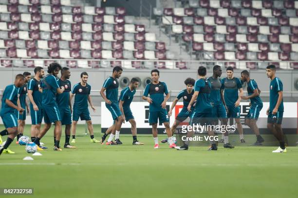 Players of the Qatar national football team in action during a training session ahead of 2018 FIFA World Cup qualifier game between China and Qatar...