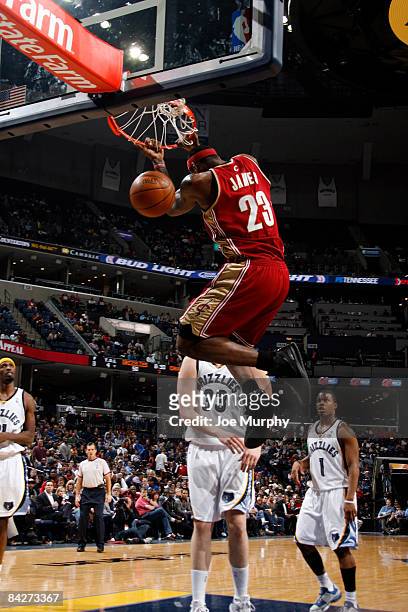 LeBron James of the Cleveland Cavaliers slams a reverse dunk in a game against the Memphis Grizzlies on January 13, 2009 at FedExForum in Memphis,...