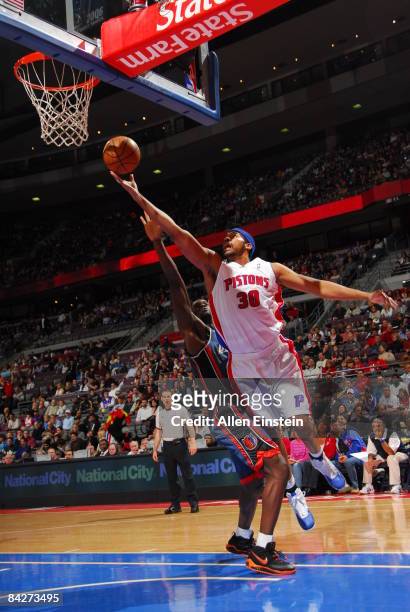 Rasheed Wallace of the Detroit Pistons attempts a shot against Emeka Okafor of the Charlotte Bobcats in a game at the Palace of Auburn Hills on...
