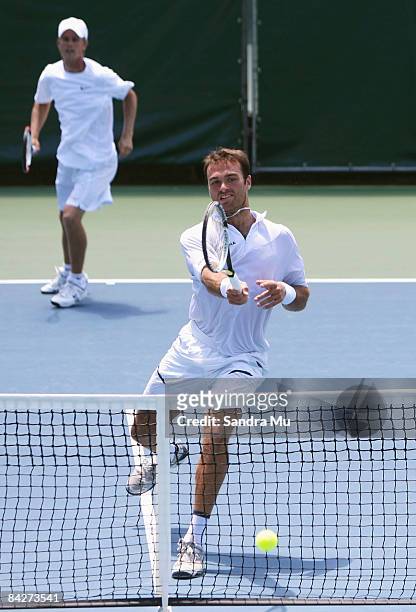 Stephen Huss of Australia and Ross Hutchins of Great Britain play thir doubles match against Michael Kohlmann of Germany and Philipp Petzschner of...
