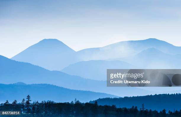 mt.akan. - japan background stock pictures, royalty-free photos & images