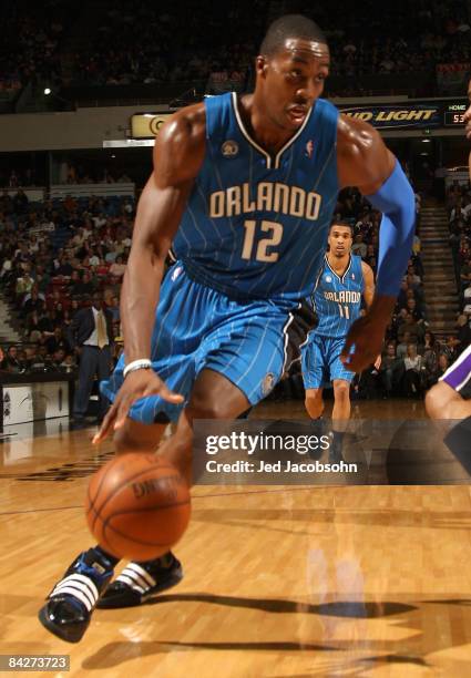 Dwight Howard of the Orlando Magic drives against the Sacramento Kings during an NBA game on January 13, 2009 at ARCO Arena in Sacramento,...