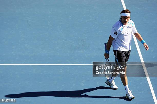 David Ferrer of Spain changes end in his second round match against Marc Gicquel of France during day three of the Heineken Open at ASB Tennis Centre...