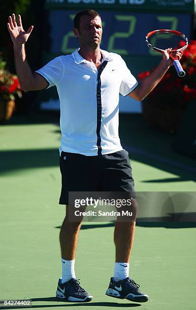 Marc Gicquel of France questions the umpire in his second round match against David Ferrer of Spain during day three of the Heineken Open at ASB...